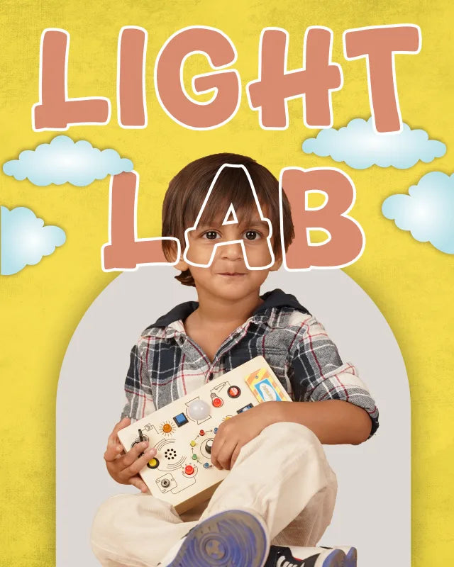 Child holding Light Lab activity board with lights and switches