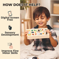 Child playing with Light Lab busy board for sensory development