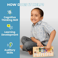 Child using phonics Montessori busy board for learning development