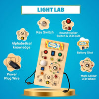 Wooden sensory activity board with switches and lights